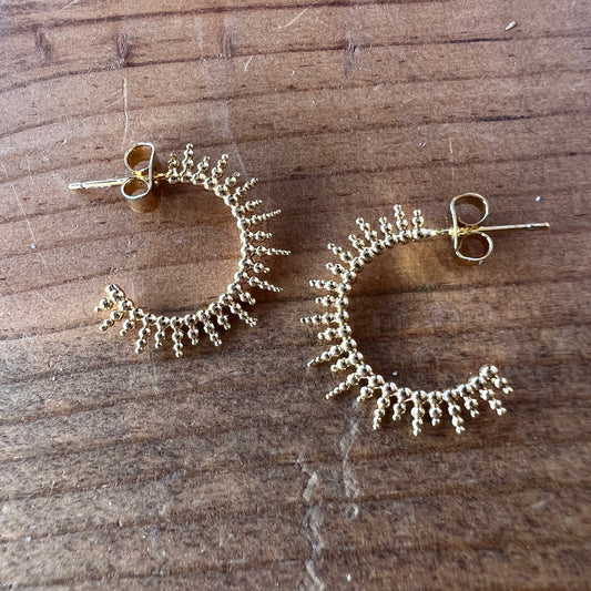 Sunburst gold hoop earrings
